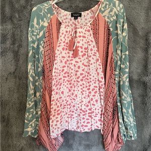 Boutique blouse by GiGiO. Multi-print, great transitional piece.